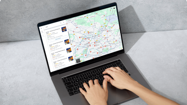 A photo of a laptop displaying google maps and several pins to showcase local presence management by LoudLocal