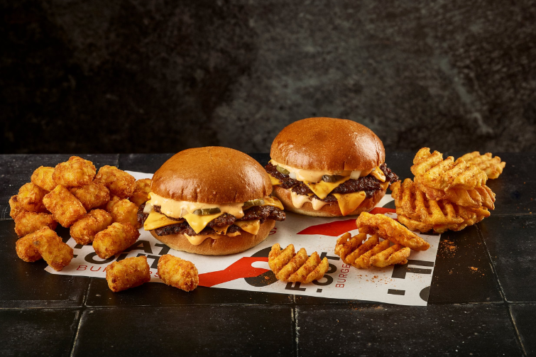 An image of burgers and fries from a taster outlet