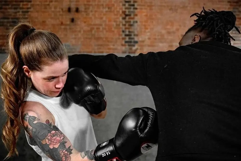 Two people sparring at Bronx boxing club in London 