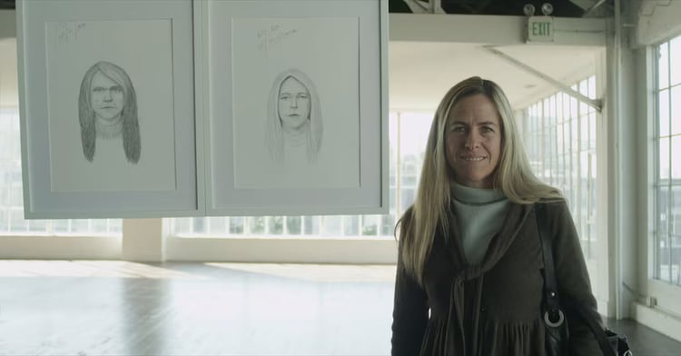 A photo from Dove's 'Real Beauty Sketches' campaign of a woman standing next to two sketches of herself.