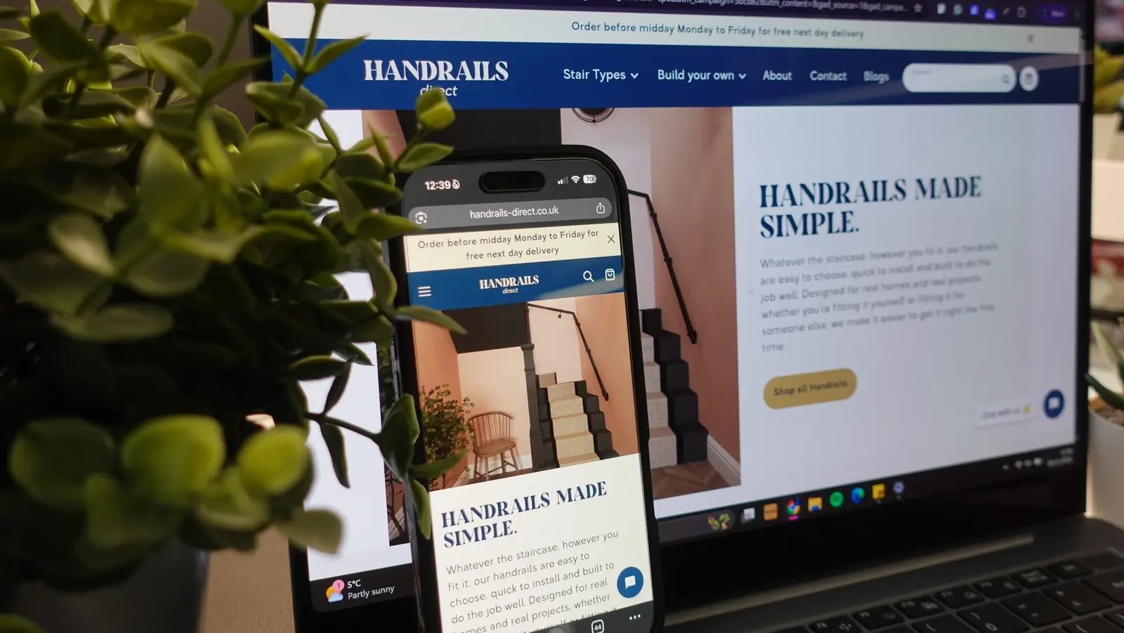 The Handrails Direct website displayed on a phone and laptop.