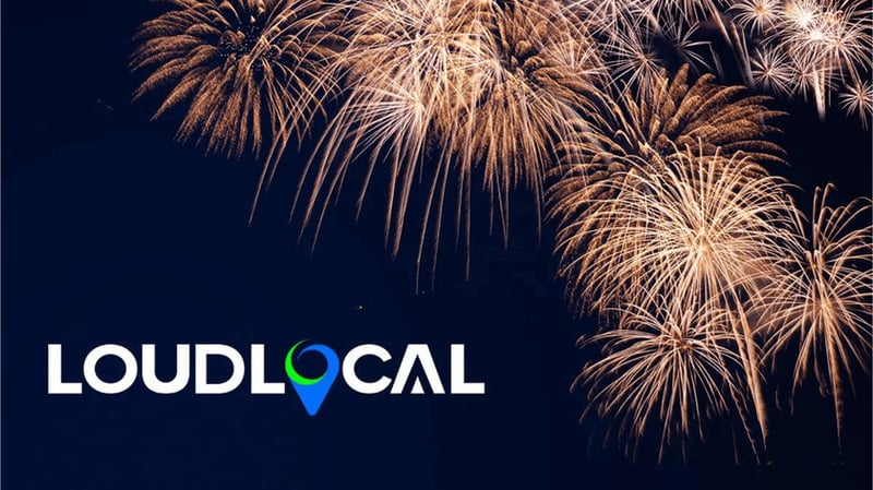 Images of fireworks, representing the launch of LoudLocal. Fireworks are showing against a dark blue background and in foreground is the LoudLocal logo, which has white text and a map marker which is half light blue and vibrant green.