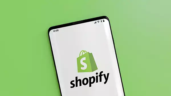 Shopify image against a green background