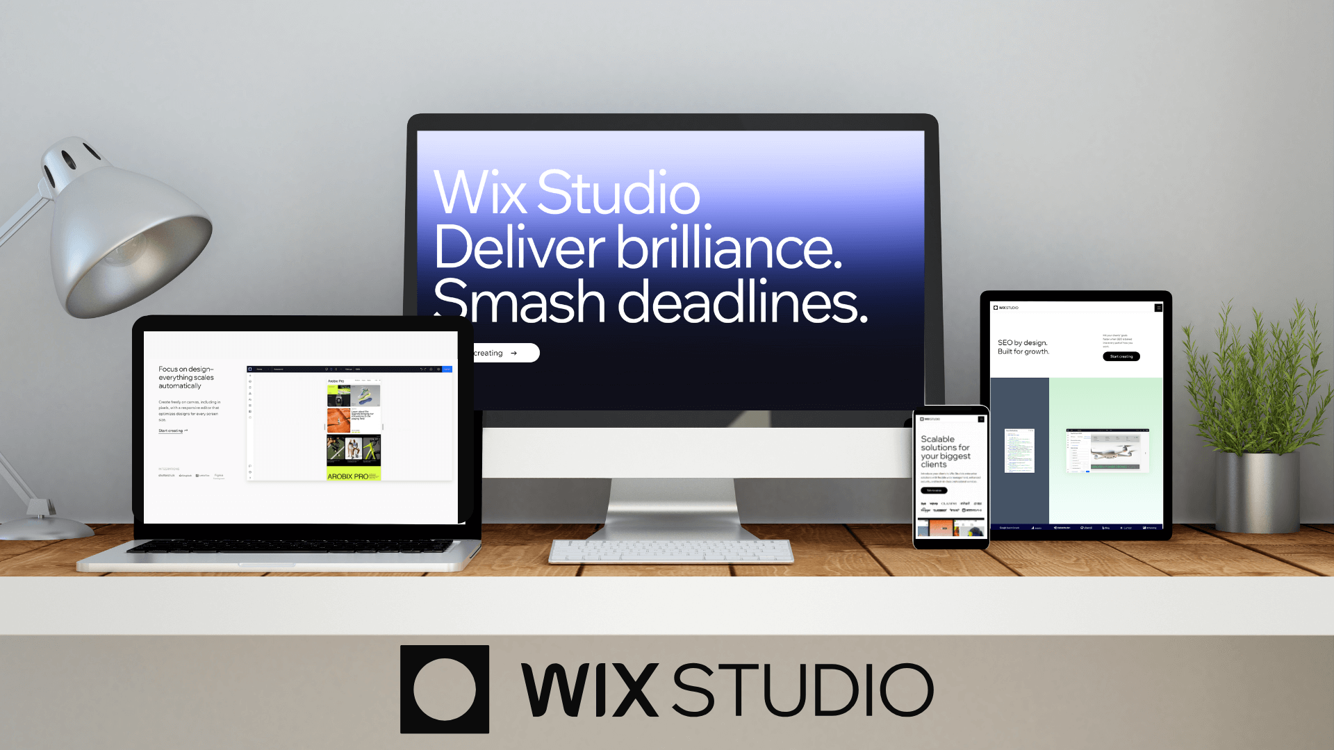 An image of different devices showing screenshots of the Wix Studio website on a desk with the Wix Studio logo below