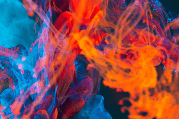 red, blue and orange coloured smoke