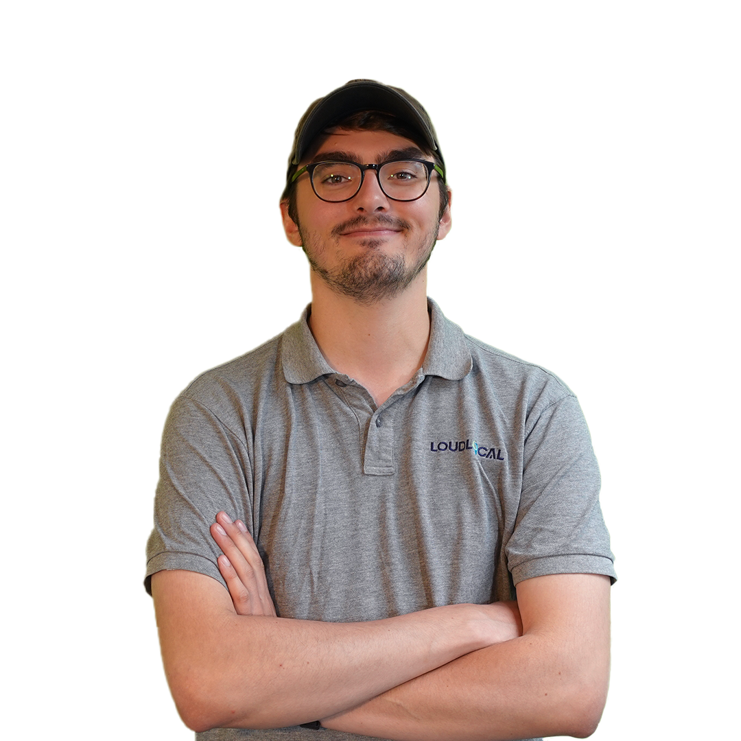 Toby Tonks is one of our assistant marketing managers. Toby is wearing a cap and a loudlocal branded t-shirt